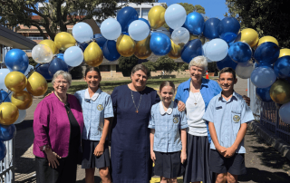 Photo showing students of Our Lady Star of the Sea Catholic Primary School Miranda with the visiting Sisters of St Joseph of Orange